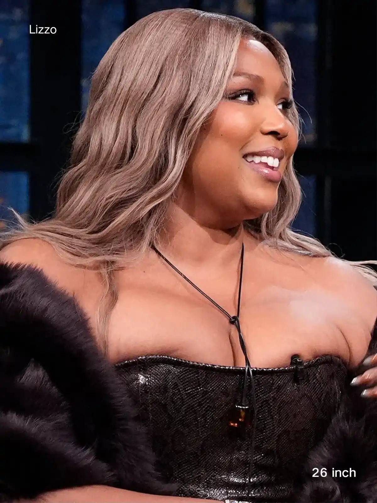 Woman with long hair brown and blonde wig with soft balayage