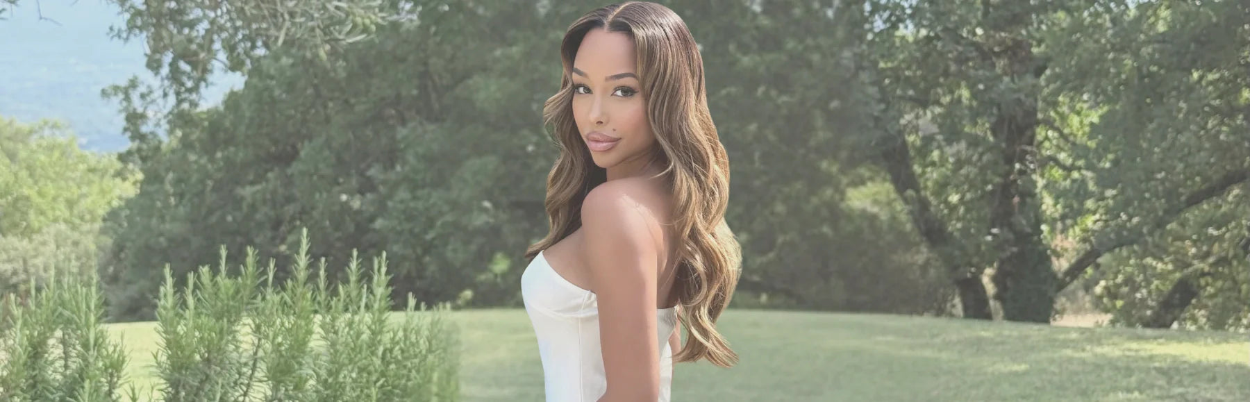 a black girl wears Hairvivi's brown colored lace front wig with natural hairline