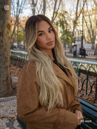 Blonde hair wig with dark roots inspired by 90s glam