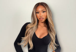 a beautiful black woman with a blonde hair wig