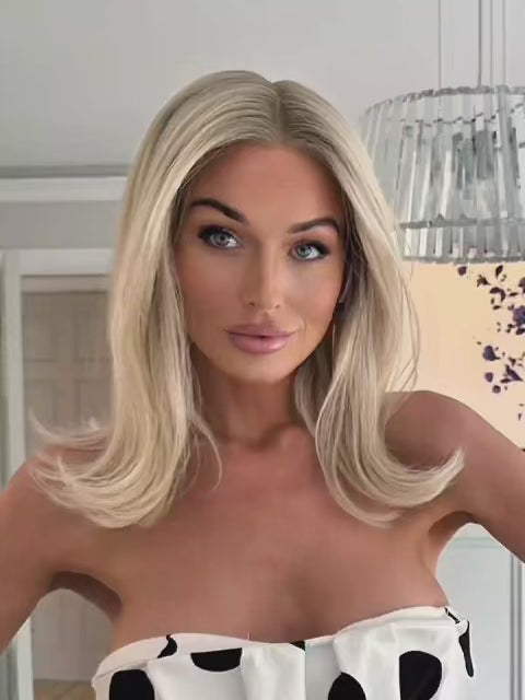 Blonde lace front wig with layered bangs and soft waves