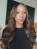 Auburn human hair wig with voluminous waves