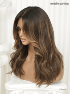 Wig with blonde highlights and soft loose waves