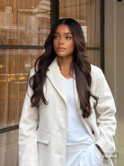 Auburn human hair wig with voluminous waves